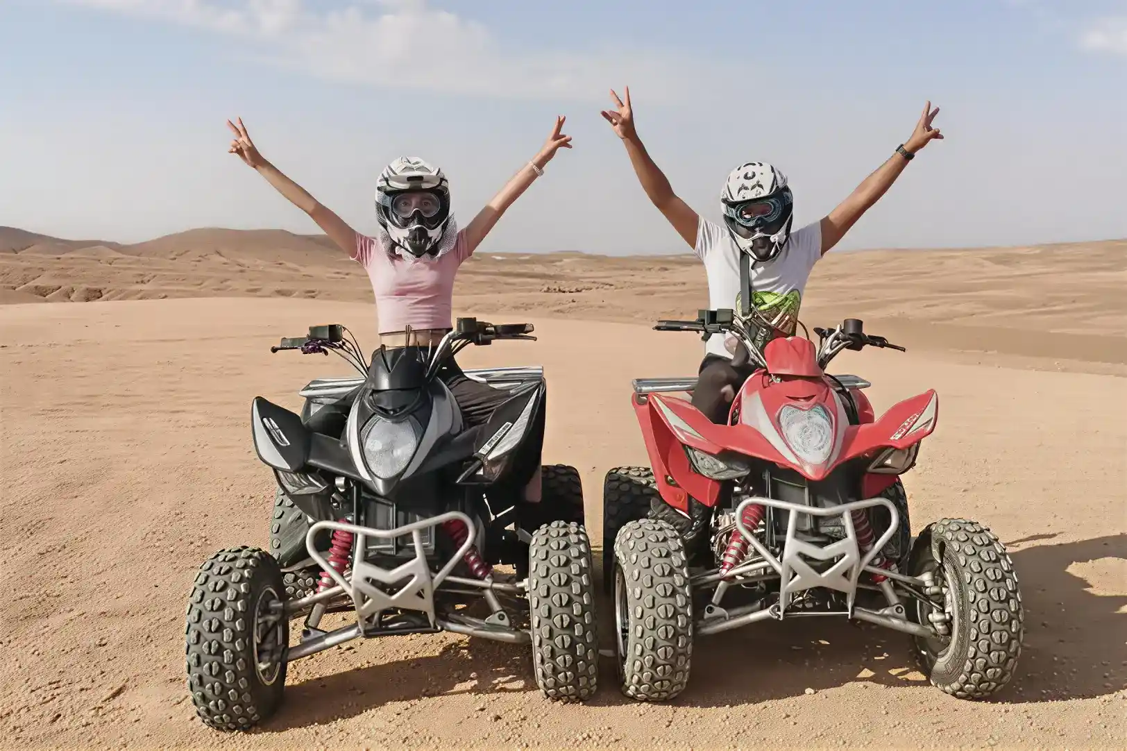 Guests riding quad bikes during an Agafay Desert adventure near Marrakech