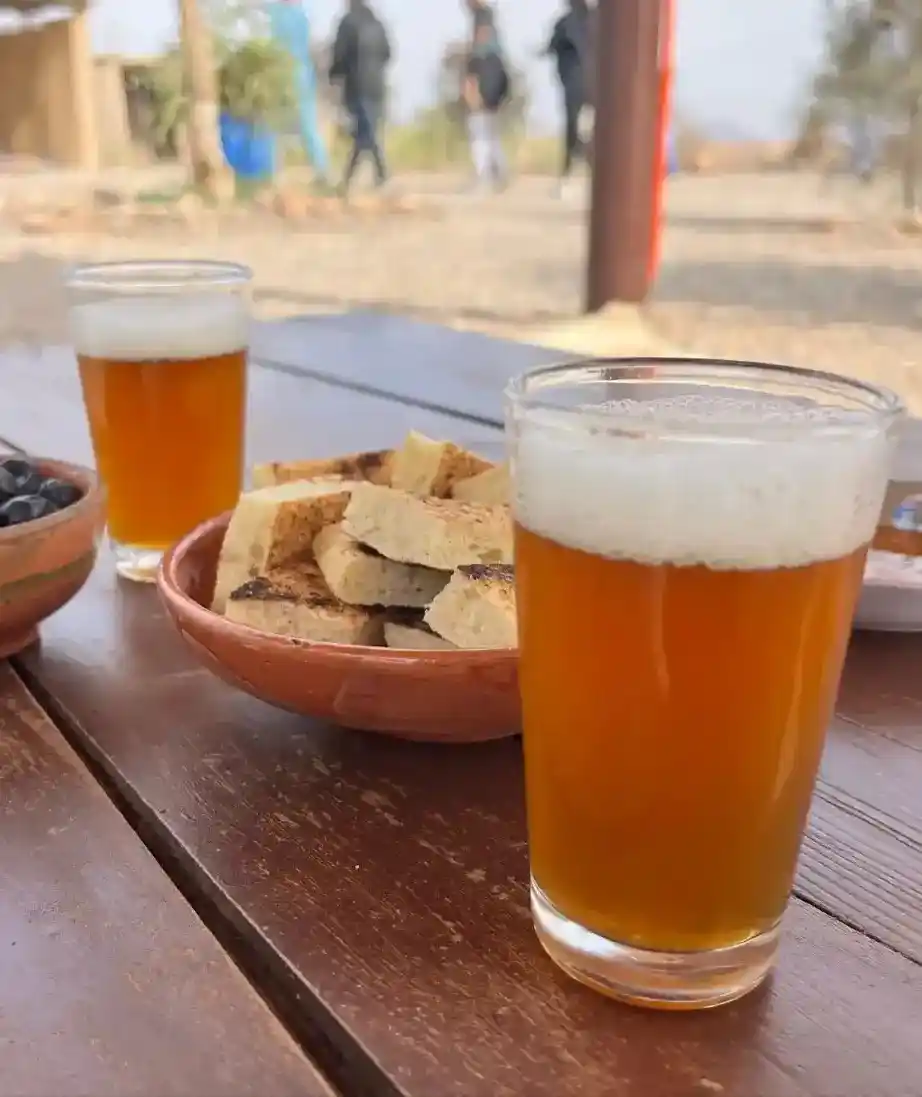 Traditional Moroccan tea and snacks served during a sunset camel ride experience in Agafay Desert near Marrakech