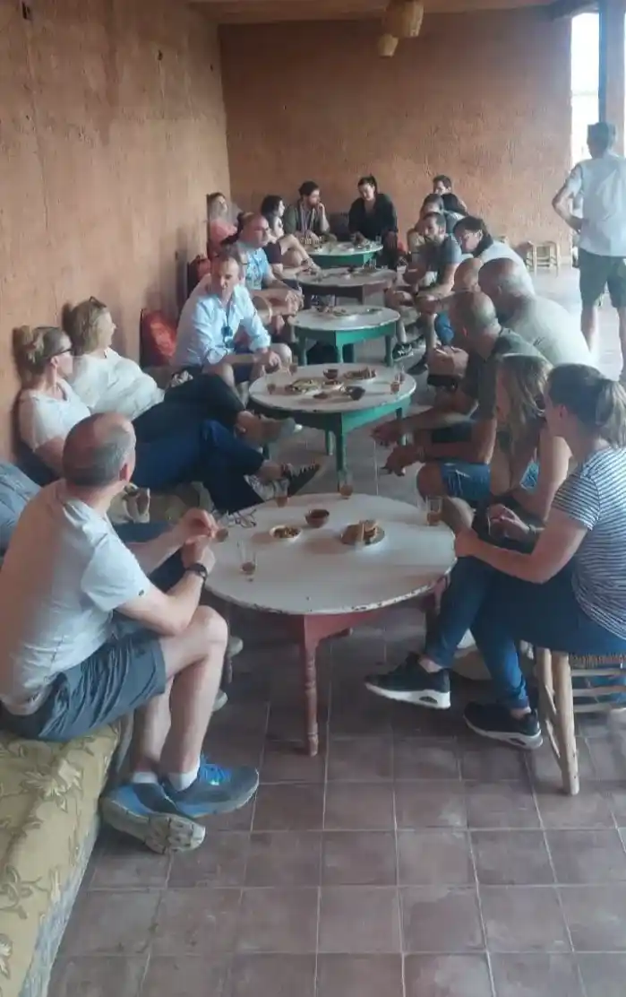 Tour guests enjoying a traditional Berber tea break near Marrakech Palmeraie