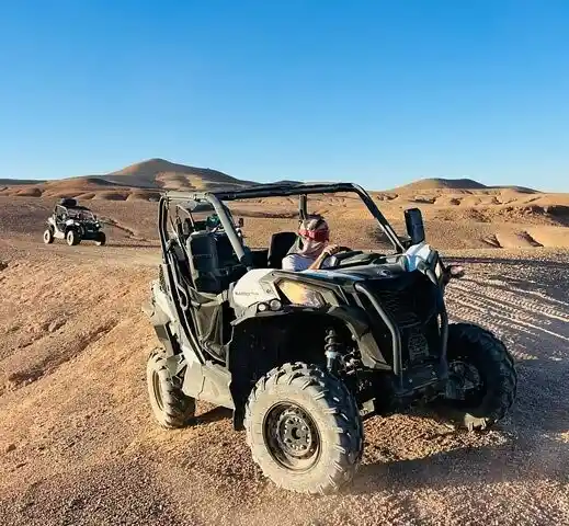 Tourist enjoying a buggy experience in the Agafay Desert near Marrakech Morocco