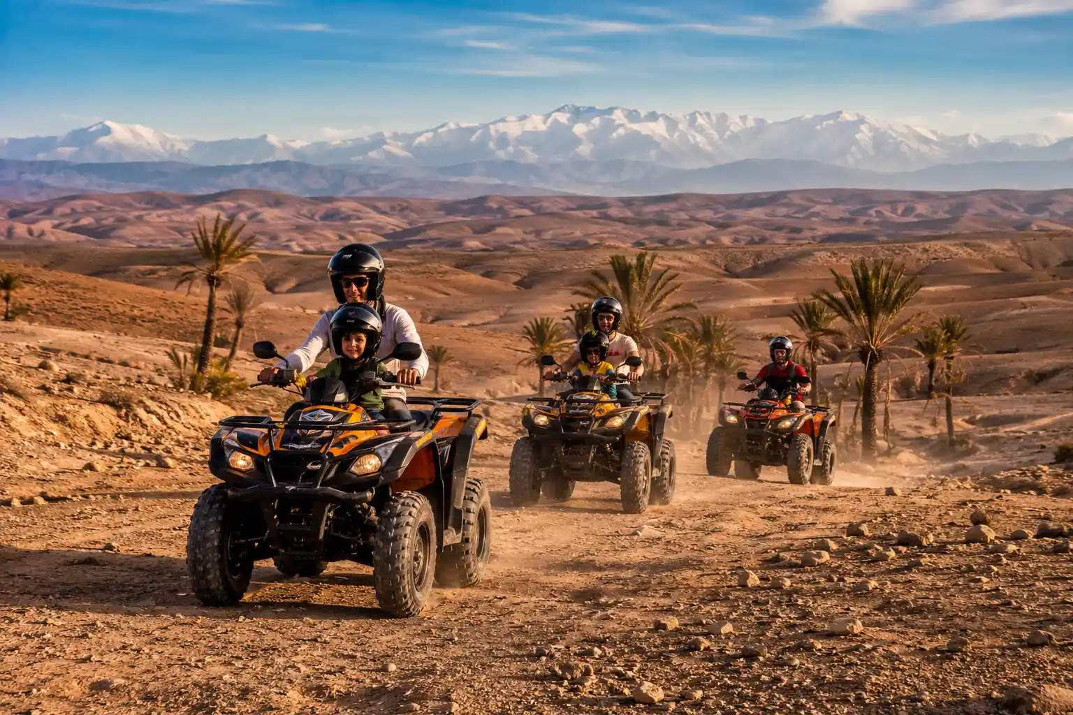 Family exploring the scenic desert landscape near Marrakech on a quad tour