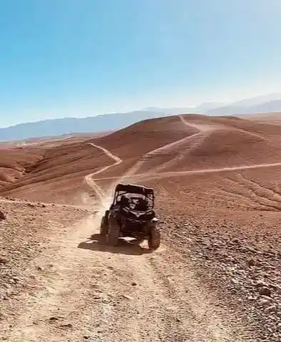 Luxury buggy driving across scenic trails in the Agafay Desert near Marrakech