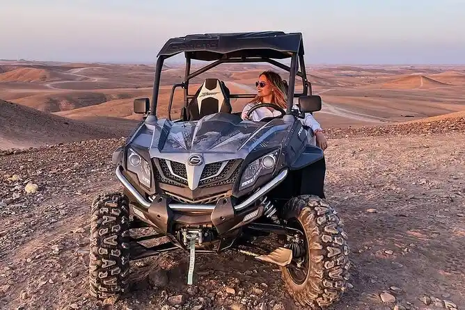 Premium buggy overlooking the landscapes of Agafay Desert on a Marrakech adventure tour