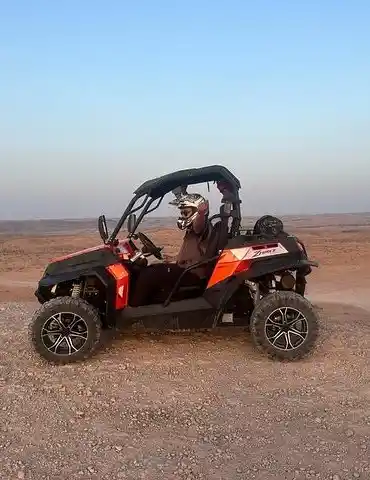 Two-seater buggy parked in the Agafay Desert during a Marrakech buggy excursion